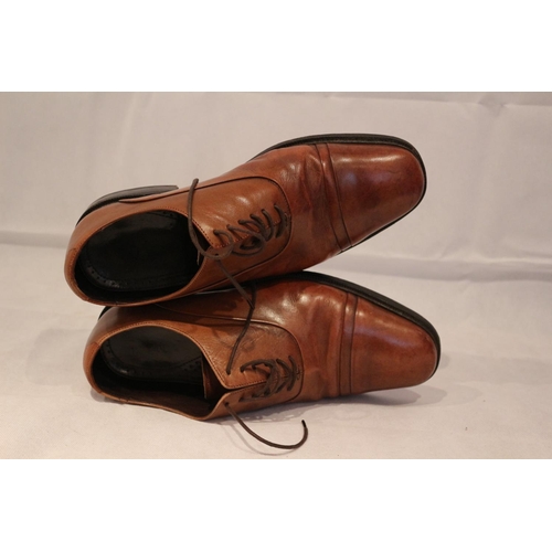 37 - A pair of brown Mark and Spencer's lace up shoes. Believed to be size 9