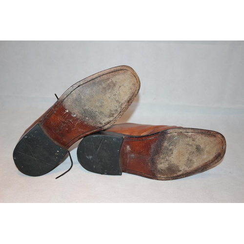 37 - A pair of brown Mark and Spencer's lace up shoes. Believed to be size 9