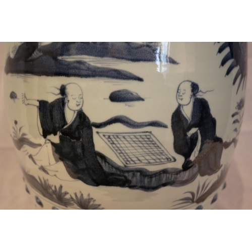 72 - A vintage Chinese transfer printed garden barrel seat. An area of print slightly faded black