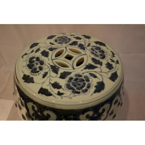 72 - A vintage Chinese transfer printed garden barrel seat. An area of print slightly faded black