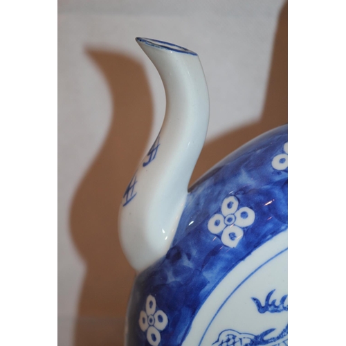 76 - Qianlong marked blue and white tea pot. Date in the region of 1900-1910