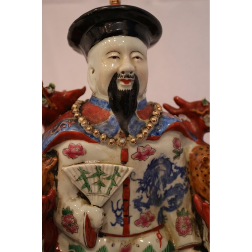 77 - Chinese emperor figure showing five toed dragon. slightly chipped horn