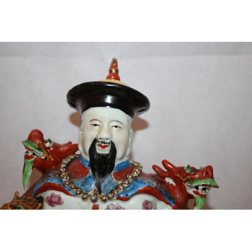 77 - Chinese emperor figure showing five toed dragon. slightly chipped horn