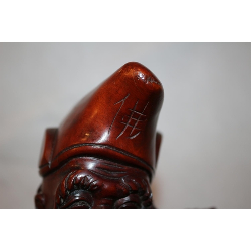 80 - Hand carved believed to be Chinese hardwood statue with begging bowl