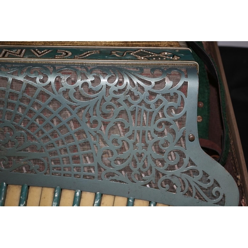 159 - A Very decorative Scandalli accordion, Scott wood Model complete with case but in need of some sligh... 