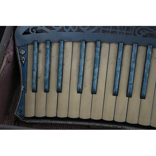 159 - A Very decorative Scandalli accordion, Scott wood Model complete with case but in need of some sligh... 