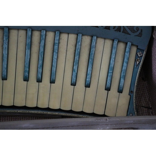 159 - A Very decorative Scandalli accordion, Scott wood Model complete with case but in need of some sligh... 