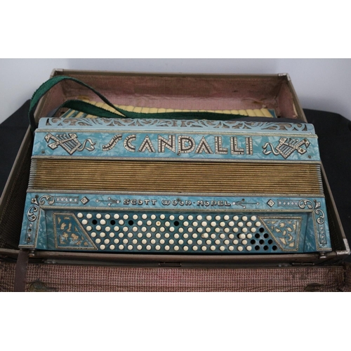 159 - A Very decorative Scandalli accordion, Scott wood Model complete with case but in need of some sligh... 