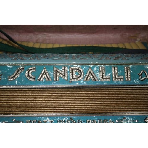 159 - A Very decorative Scandalli accordion, Scott wood Model complete with case but in need of some sligh... 