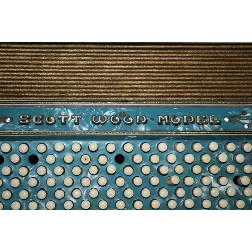 159 - A Very decorative Scandalli accordion, Scott wood Model complete with case but in need of some sligh... 