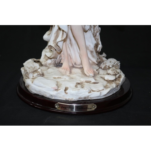 16 - Angelina Collection Figurine with a Crane Bird, has slight damage to toe