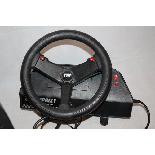 42 - PC Games Steering Wheel and Pedals By Trustmaster. Also One Metal Detector. Un tested