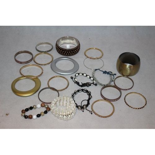 50 - An assortment of Costume Jewellery Bangles