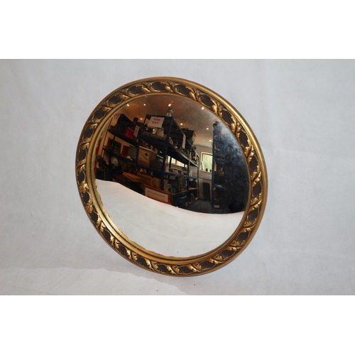 52 - Convex Mirror in ornate gold coloured frame approx 35cm