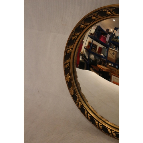 52 - Convex Mirror in ornate gold coloured frame approx 35cm