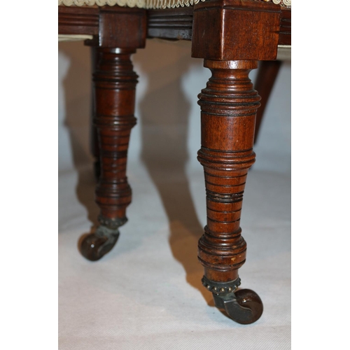 54 - Two nursery chairs with ornate carved backs complete with original casters