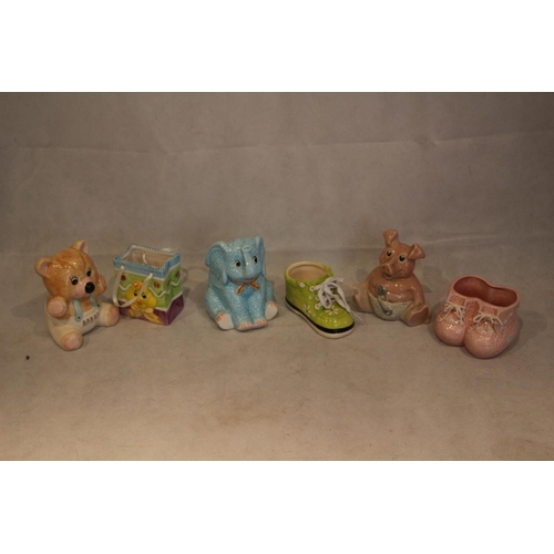 72 - An assortment of children's pottery including Nat West Baby with Original Stopper