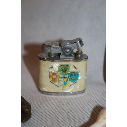 73 - Armac petrol Lighter with Irish Theme, Cigarette case, Old Nutcrackers and a Mother of Pearl and She... 