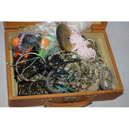 74 - A Jewellery  box containing a selection of  costume jewellery