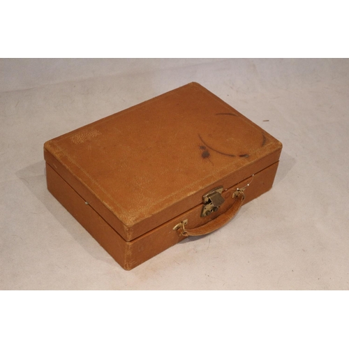 74 - A Jewellery  box containing a selection of  costume jewellery