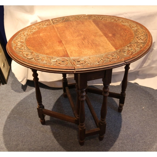 75 - Highly Carved Drop Leaf serving table. Aged