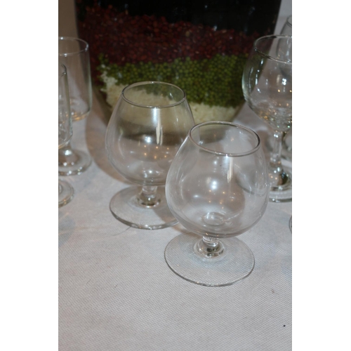 79 - A Collection of Glasses including 2 brandy glasses and  a Large Vase filled with dried peppers and o... 