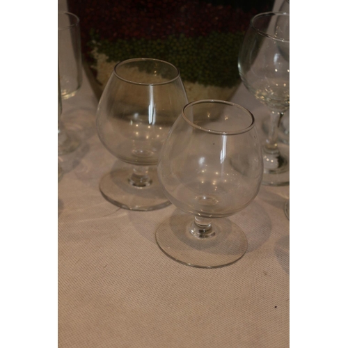 79 - A Collection of Glasses including 2 brandy glasses and  a Large Vase filled with dried peppers and o... 