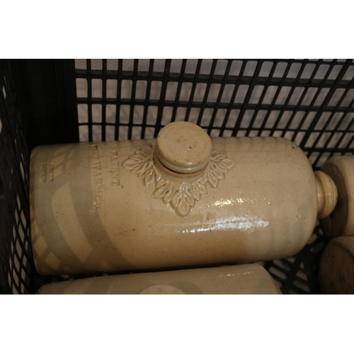 80 - An assortment of stoneware water bottles including Doulton