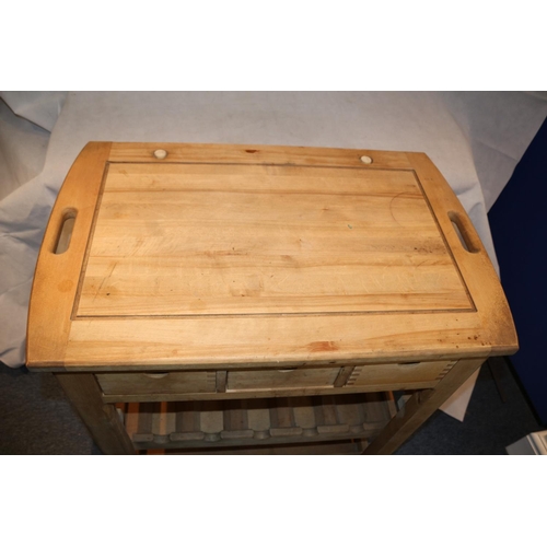 90 - Pine Kitchen preparation trolley with 3 drawers and Wine Rack with slide out cutting board.