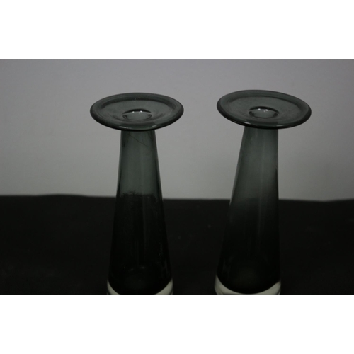 192 - A Pair of Dusted Black Glass Candle Stick Holders