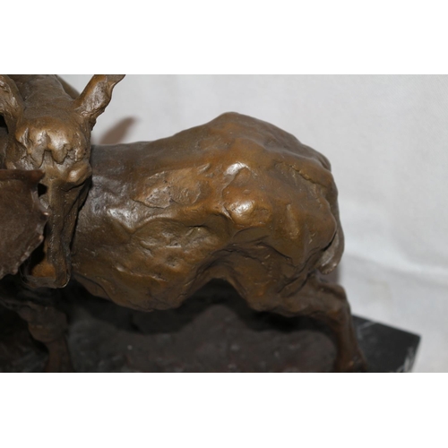 209 - A Beautiful Bronze Sculpture Of A Male and Female Moose Mounted On A Heavy Black Marble Base  Sculpt... 