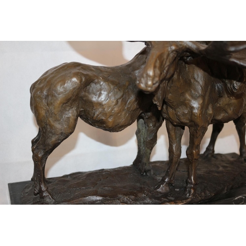 209 - A Beautiful Bronze Sculpture Of A Male and Female Moose Mounted On A Heavy Black Marble Base  Sculpt... 