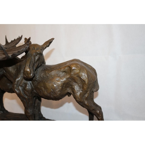 209 - A Beautiful Bronze Sculpture Of A Male and Female Moose Mounted On A Heavy Black Marble Base  Sculpt... 