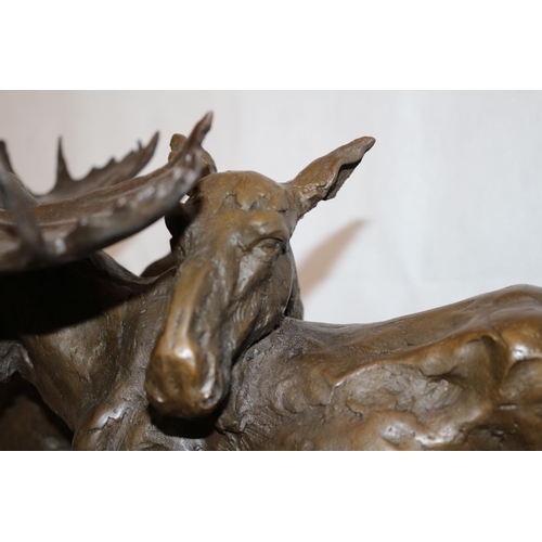 209 - A Beautiful Bronze Sculpture Of A Male and Female Moose Mounted On A Heavy Black Marble Base  Sculpt... 