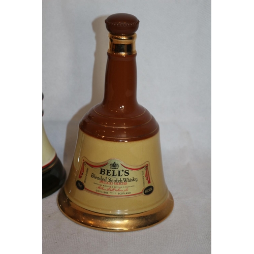 261 - Pair of Empty Bell's Scotch Whisky Wade Display Bell Bottles