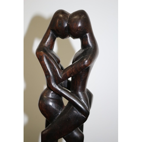 290 - A Wooden Carved Sculpture of Lovers