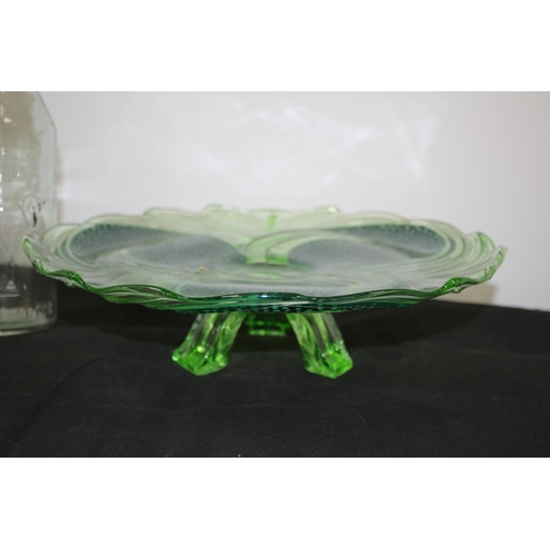 295 - A Large Green Swirl Pattern Cake Server/Platter and An Absolutely Pure Milk Pouring Bottle