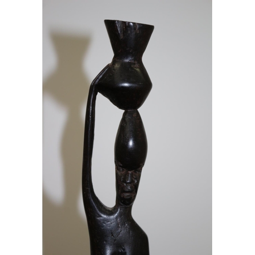 304 - Carved wooden African Statue of Lady Water Carrier