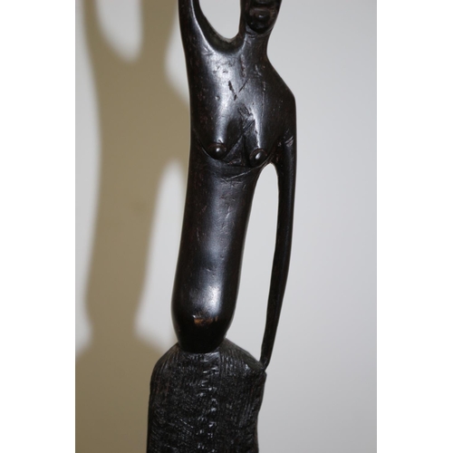 304 - Carved wooden African Statue of Lady Water Carrier