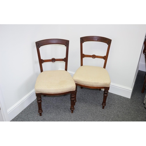 308 - Two Wooden Hall Chairs with Carved motif Backs and Turn Front Legs. One needs back tightening