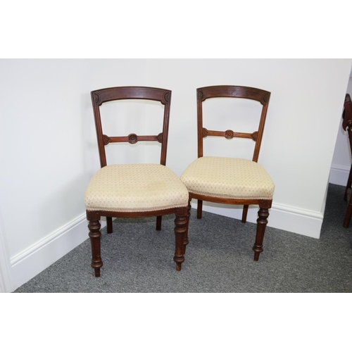 308 - Two Wooden Hall Chairs with Carved motif Backs and Turn Front Legs. One needs back tightening