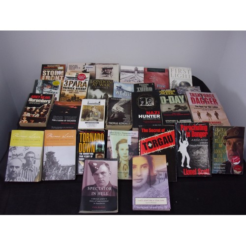 524 - A Quanity of Books reflecting War Including Books on The Holocaust