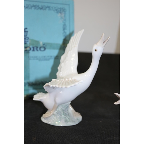 226 - Two New Boxed Lladro White Geese