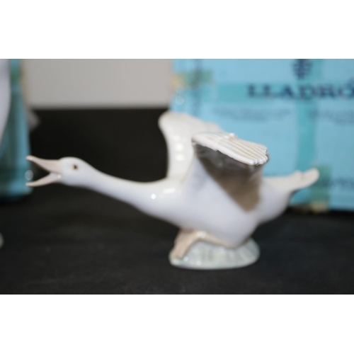 226 - Two New Boxed Lladro White Geese