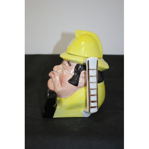 231 - 3 Teapots Including a Grumpy Looking Staffordshire Fireman, A Royal Doulton Carmel, and a Biltons of... 