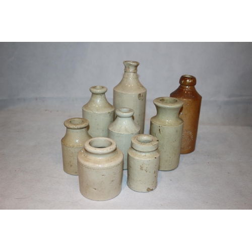 260 - A Selection of Stoneware Bottles with One From Western & Wolland Bermondsey