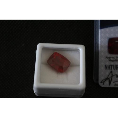 274 - Synthetic Ruby - Red in Colour - With Original Laboratory Certificate. Shape and Cut Being Cushion. ... 