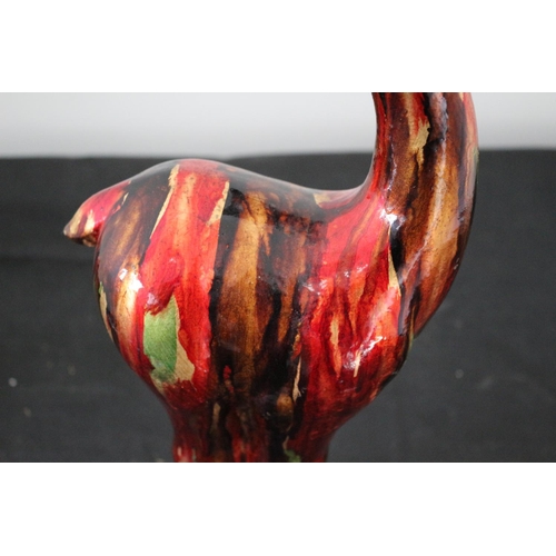 327 - A Multi Coloured Composite Deer Statue