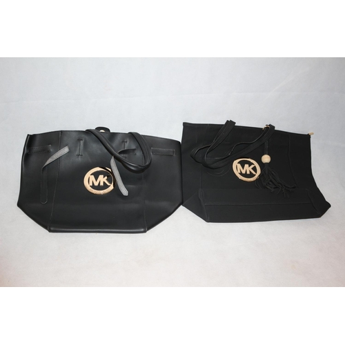 361 - 2 New black handbags in dust covers