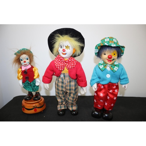 402 - An assortment of Doll Like Characters Including Japanese Porcelain doll